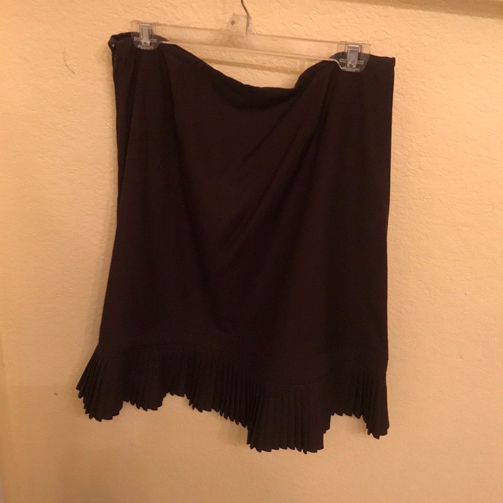 Brown below the knee skirt- pleats along bottom